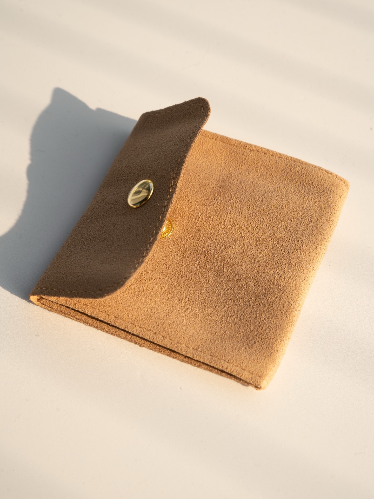 Caramel suede pouch with gold snap